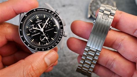 omega x swatch metal strap.